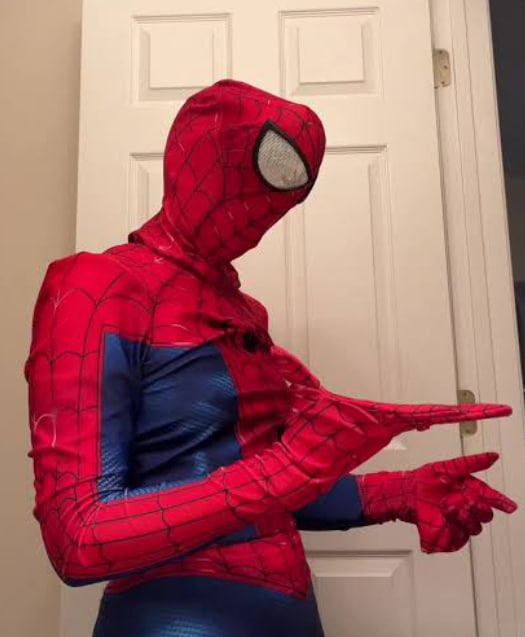 spiderman cosplay doing web hands
